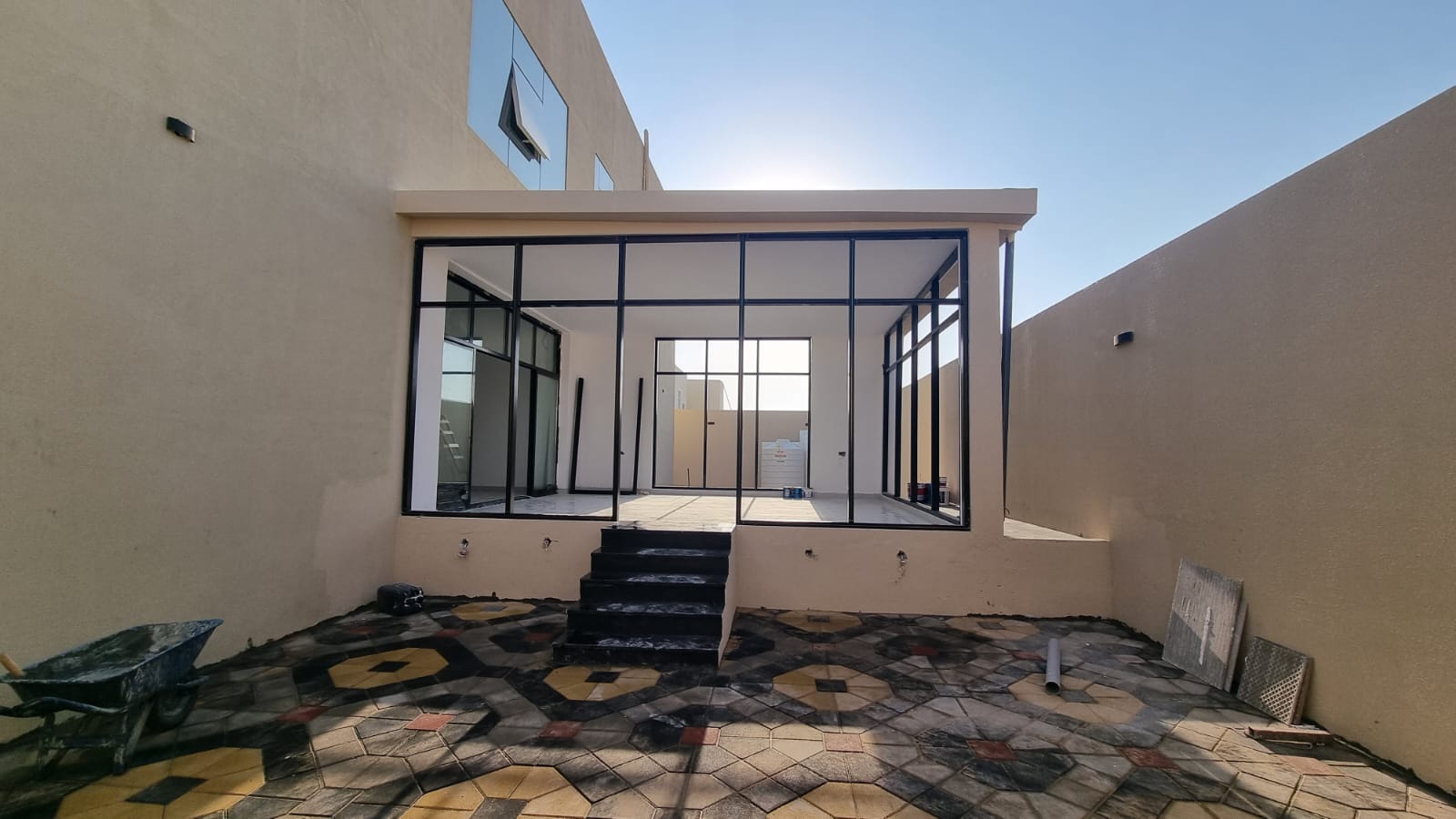 Courtyard with full-height glazing.