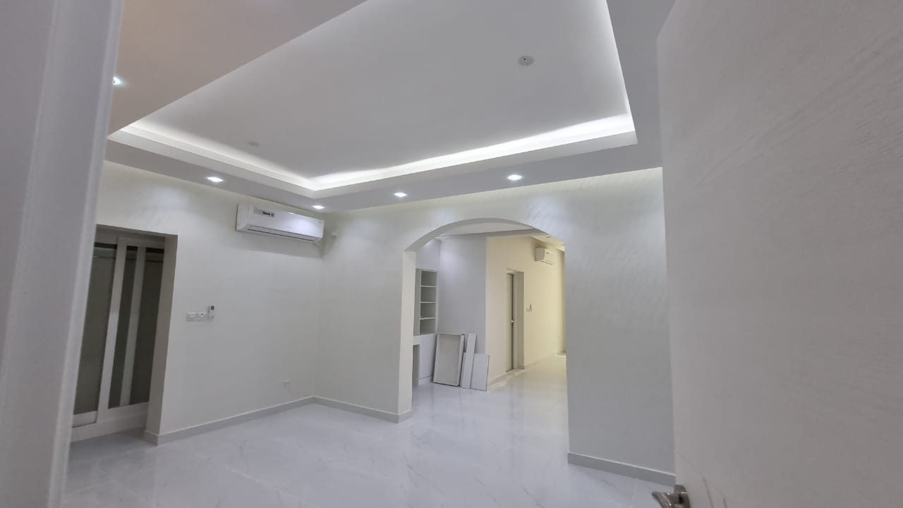 Finished living room with cove lighting, Al Rahba