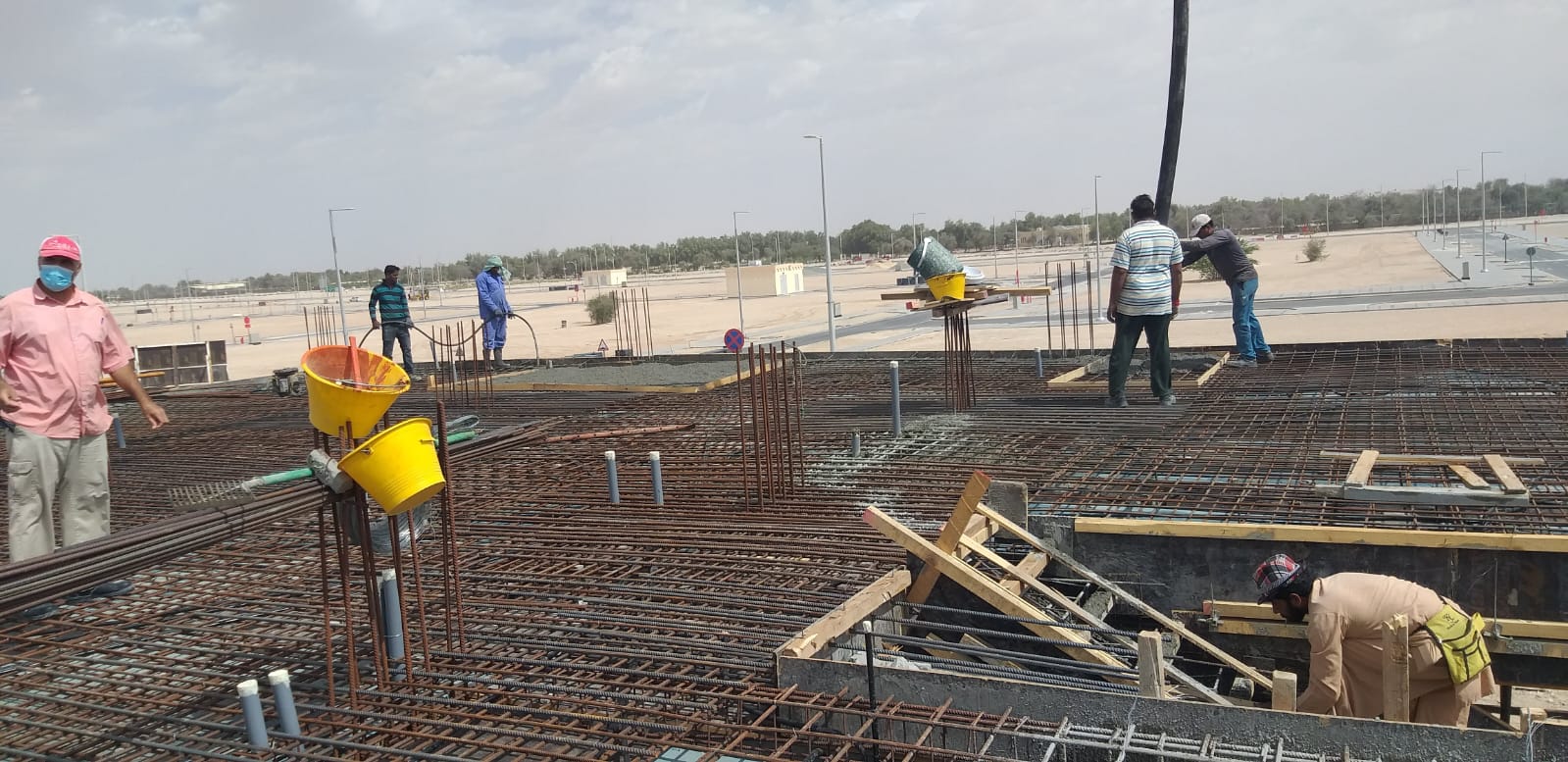 Slab reinforcement laid with concrete pump in position, Shamkha South.